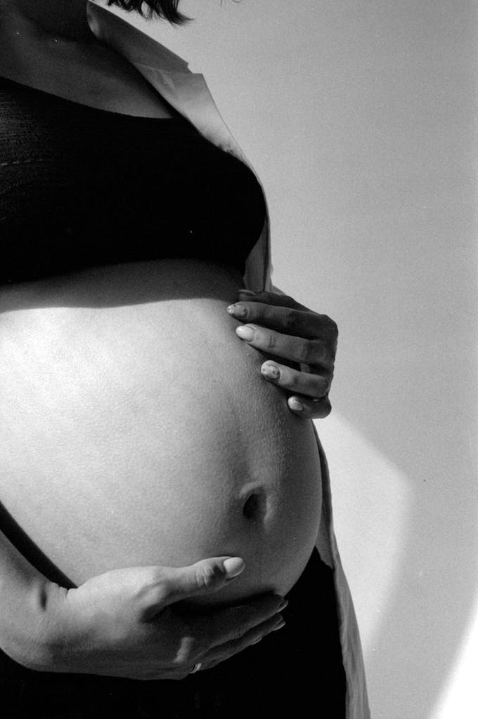 Black and White Photograph of a Pregnant Woman
